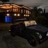 View to the west, electrified 1973 VW Thing, Andersen MultiGlide sliding glass door system, Andersen 100 series windows & doors. Note the blue glow of the 48KWH of Blue Ion 2.0 batteries in the garage.
